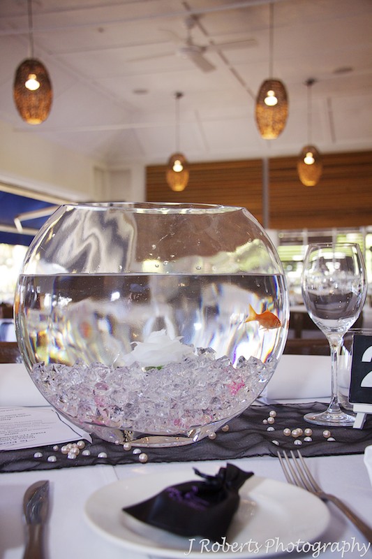 Fishbowl with fish centre piece at wedding reception - wedding photography sydney